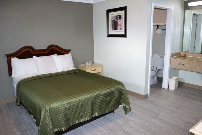 Imagen de la habitación del Hotel Deluxe Inn Motel, Lake Charles. Foto 14