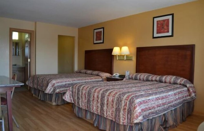 Imagen de la habitación del Hotel Deluxe Inn and Suites Weslaco. Foto 10