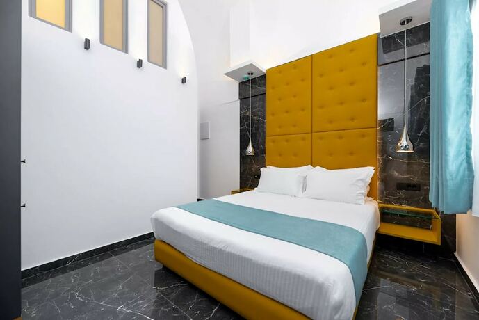 Imagen de la habitación del Hotel Deluxe Santorini. Foto 13
