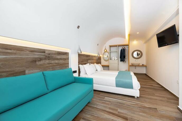 Imagen de la habitación del Hotel Deluxe Santorini. Foto 17