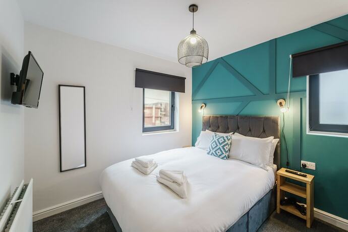 Imagen de la habitación del Hotel Deluxe Studio Apartments. Foto 11