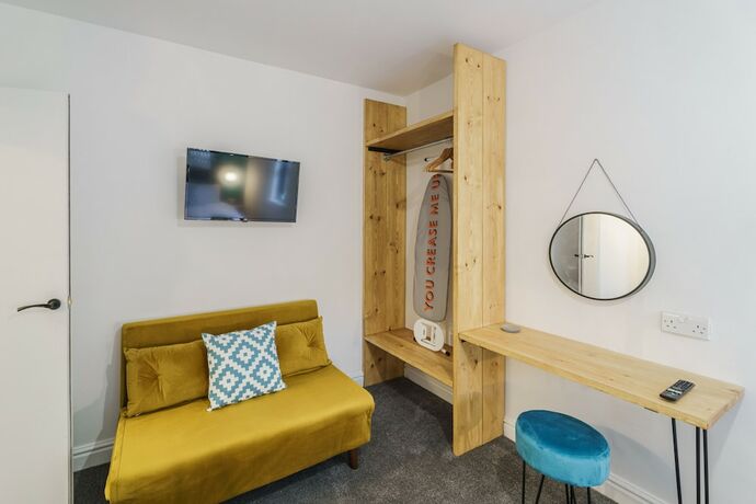 Imagen de la habitación del Hotel Deluxe Studio Apartments. Foto 12