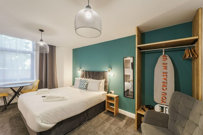 Imagen de la habitación del Hotel Deluxe Studio Apartments. Foto 13