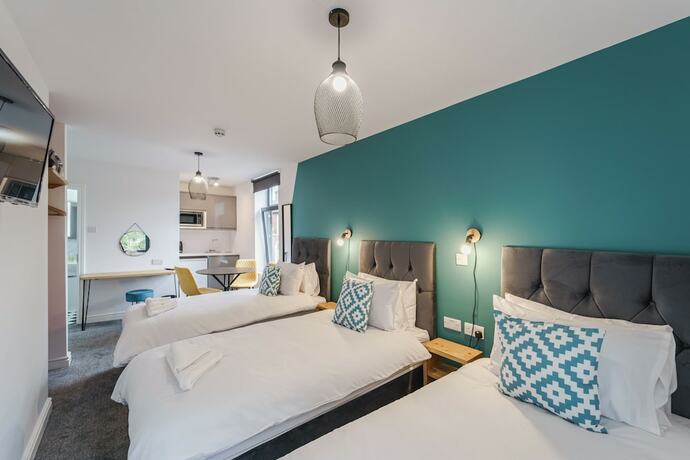 Imagen de la habitación del Hotel Deluxe Studio Apartments. Foto 19