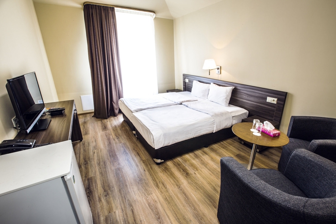 Imagen de la habitación del Hotel Deluxe Yerevan. Foto 8