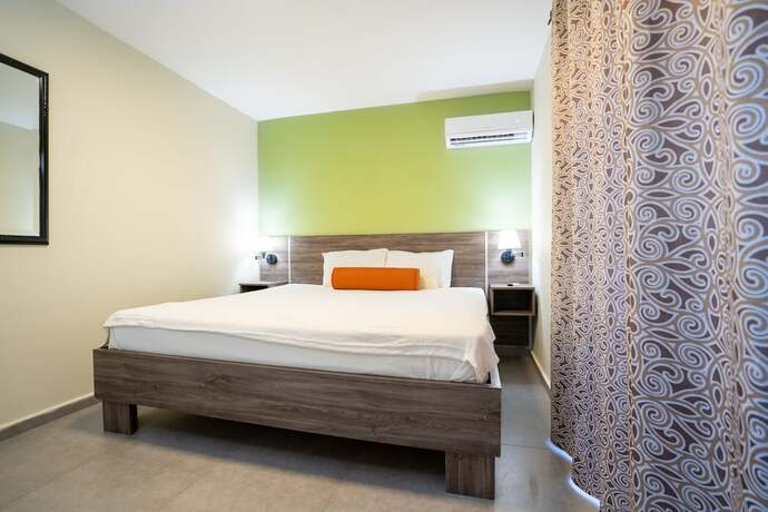 Imagen de la habitación del Hotel Delynne Boutique. Foto 17