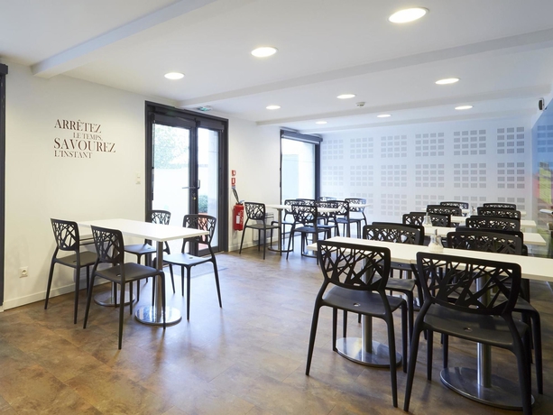 Imagen del bar/restaurante del Hotel Demain and Conciergerie. Foto 2