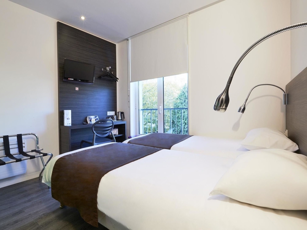 Imagen de la habitación del Hotel Demain and Conciergerie. Foto 10