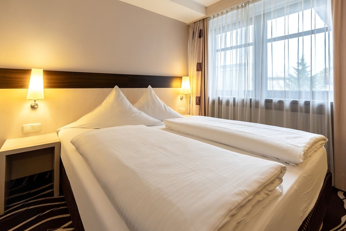 Imagen de la habitación del Hotel Demas Garni. Foto 8