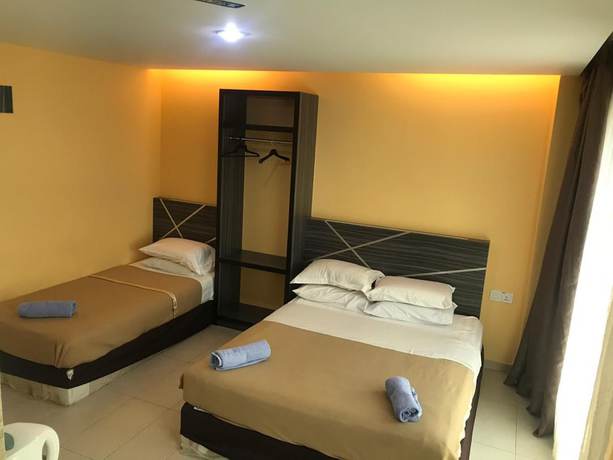 Imagen de la habitación del Hotel De'mawardah Inn. Foto 3