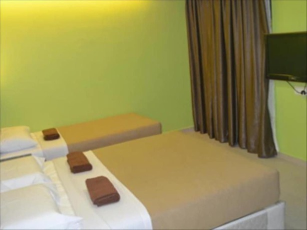 Imagen de la habitación del Hotel De'mawardah Inn. Foto 6