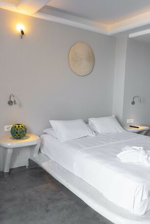 Imagen de la habitación del Hotel Demilmar Luxury Suites. Foto 18