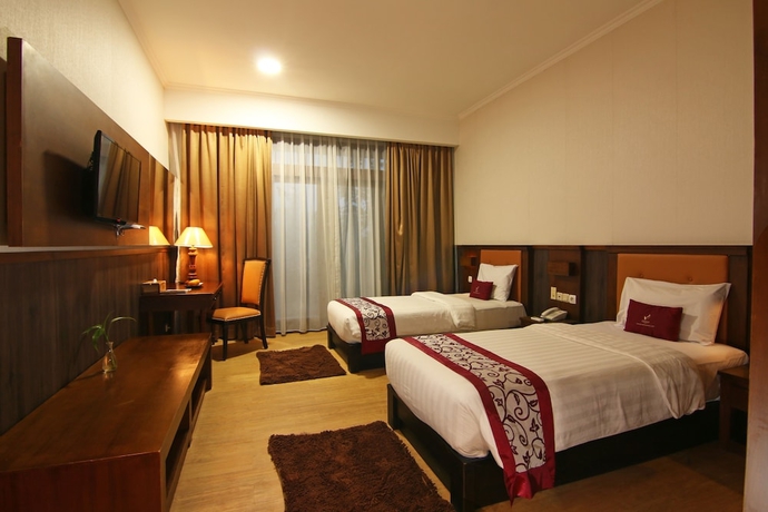 Imagen de la habitación del Hotel D'emmerick Salib Putih Salatiga. Foto 2