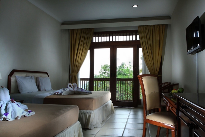 Imagen de la habitación del Hotel D'emmerick Salib Putih Salatiga. Foto 4