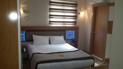Imagen de la habitación del Hotel Demosan City Otel. Foto 4
