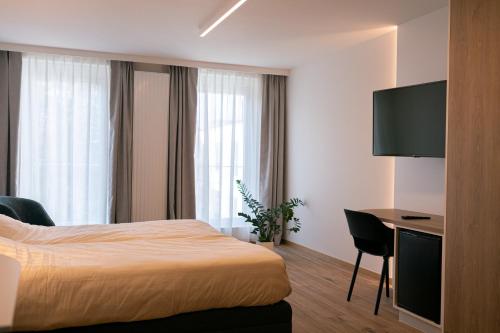 Imagen de la habitación del Hotel Den Briel. Foto 17