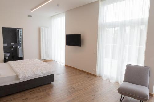 Imagen de la habitación del Hotel Den Briel. Foto 18