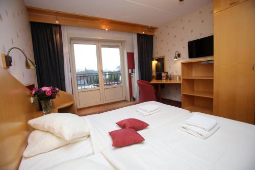 Imagen de la habitación del Hotel Den Burg. Foto 8