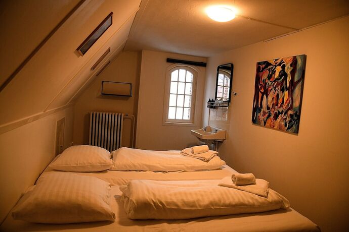 Imagen de la habitación del Hotel Den Gamle Arrest. Foto 16
