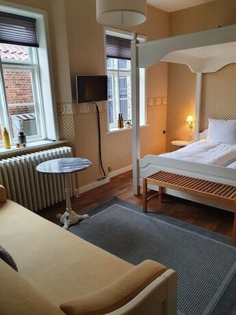 Imagen de la habitación del Hotel Den Gamle Arrest. Foto 19