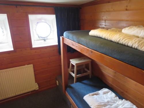 Imagen de la habitación del Hotel Den R&ouml;da B&aring;ten. Foto 43