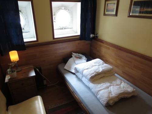 Imagen de la habitación del Hotel Den R&ouml;da B&aring;ten. Foto 45