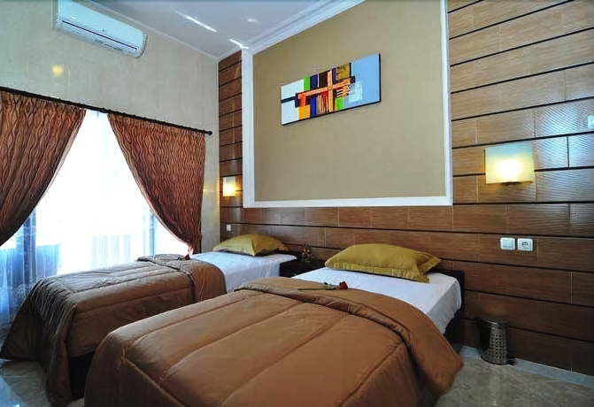 Imagen de la habitación del Hotel Denays House. Foto 11