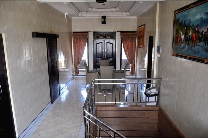 Imagen de la habitación del Hotel Denays House. Foto 14