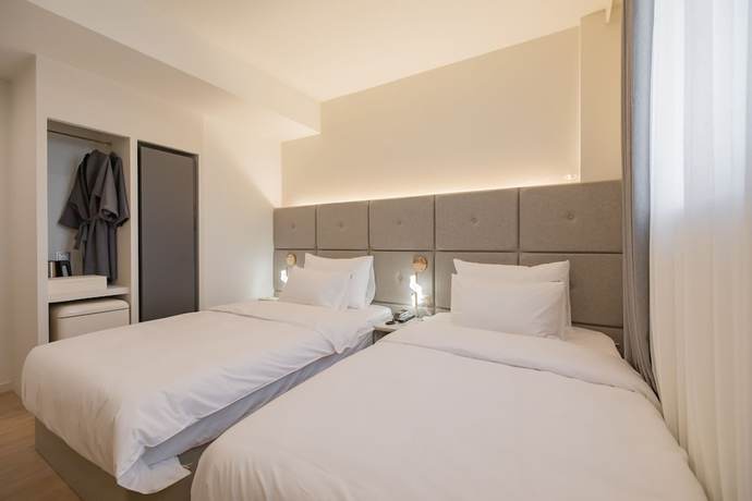 Imagen de la habitación del Hotel Denbasta heritage. Foto 17