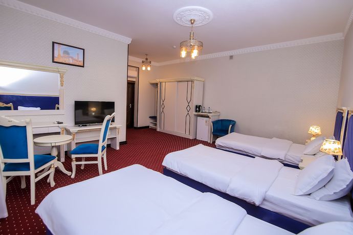 Imagen de la habitación del Hotel Dendi Plaza. Foto 2