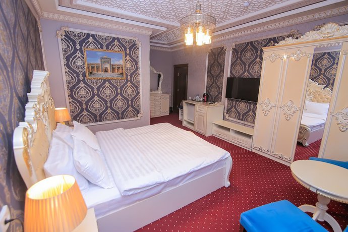 Imagen de la habitación del Hotel Dendi Plaza. Foto 5