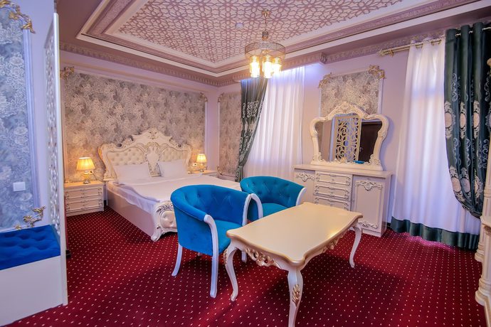 Imagen de la habitación del Hotel Dendi Plaza. Foto 6