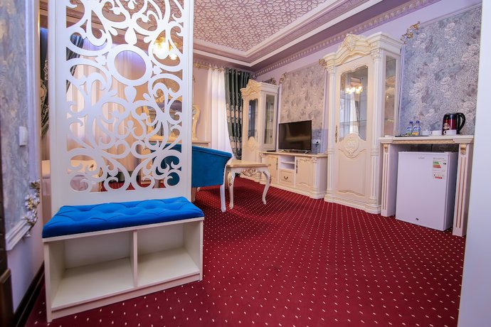 Imagen de la habitación del Hotel Dendi Plaza. Foto 7