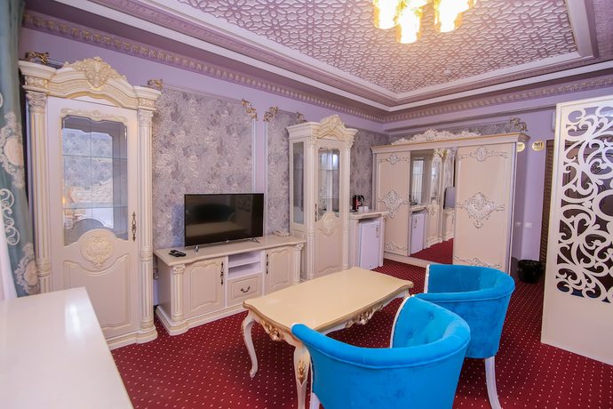 Imagen de la habitación del Hotel Dendi Plaza. Foto 8