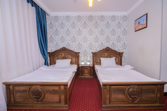 Imagen de la habitación del Hotel Dendi Plaza. Foto 9