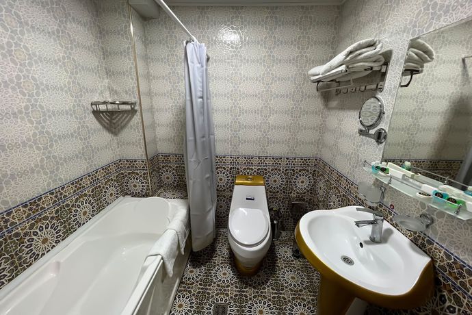 Imagen de la habitación del Hotel Dendi Plaza. Foto 10