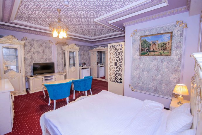 Imagen de la habitación del Hotel Dendi Plaza. Foto 11