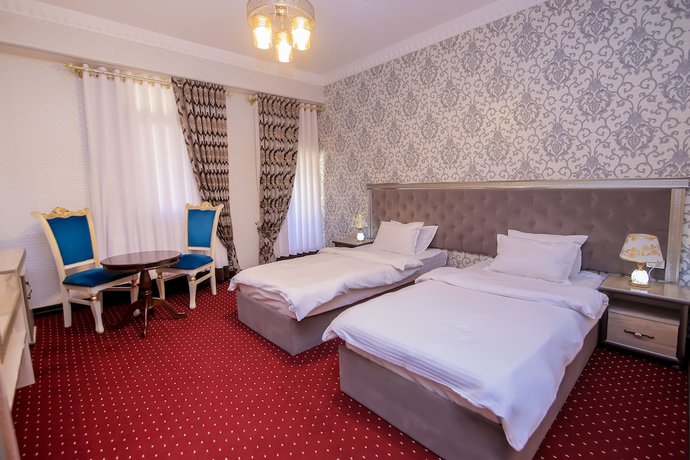 Imagen de la habitación del Hotel Dendi Plaza. Foto 15