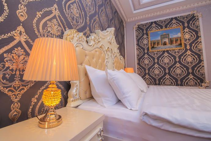 Imagen de la habitación del Hotel Dendi Plaza. Foto 16