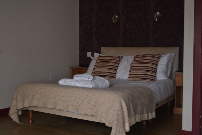 Imagen de la habitación del Hotel Dene Guest House. Foto 7