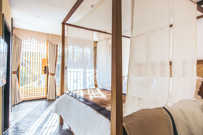 Imagen de la habitación del Hotel Dengfeng Qingjing Courtyard. Foto 6
