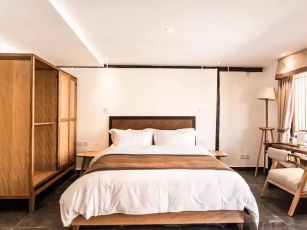 Imagen de la habitación del Hotel Dengfeng Qingjing Courtyard. Foto 10