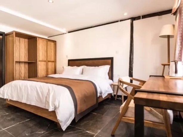 Imagen de la habitación del Hotel Dengfeng Qingjing Courtyard. Foto 11