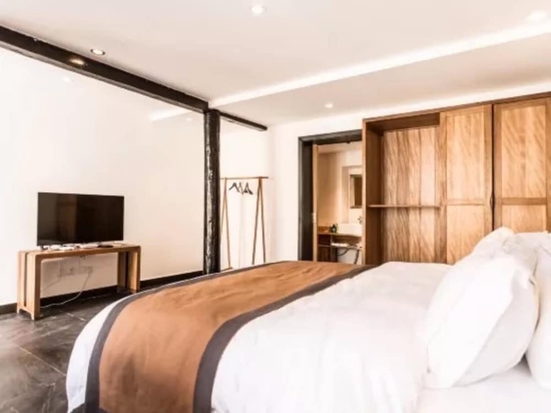 Imagen de la habitación del Hotel Dengfeng Qingjing Courtyard. Foto 12