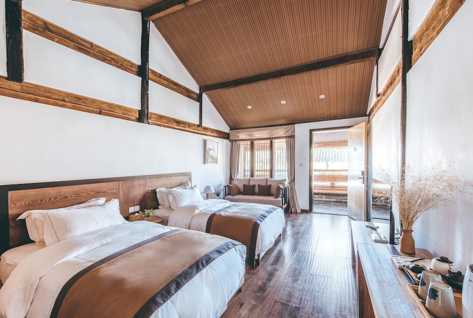 Imagen de la habitación del Hotel Dengfeng Qingjing Courtyard. Foto 13