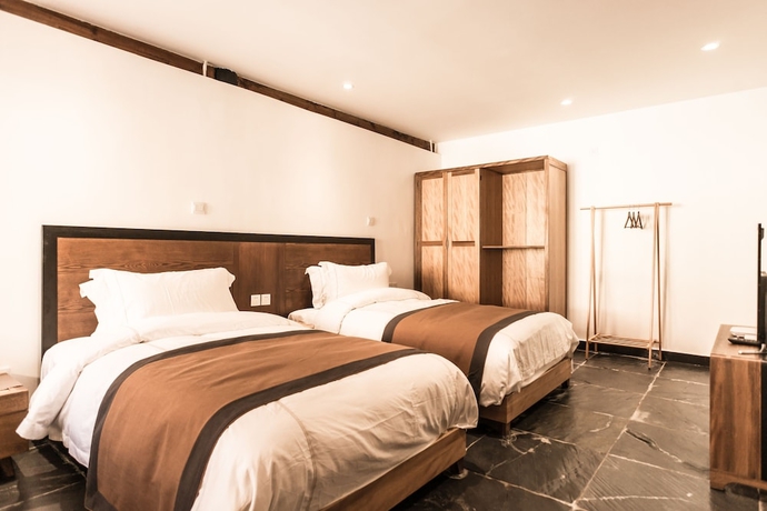 Imagen de la habitación del Hotel Dengfeng Qingjing Courtyard. Foto 14