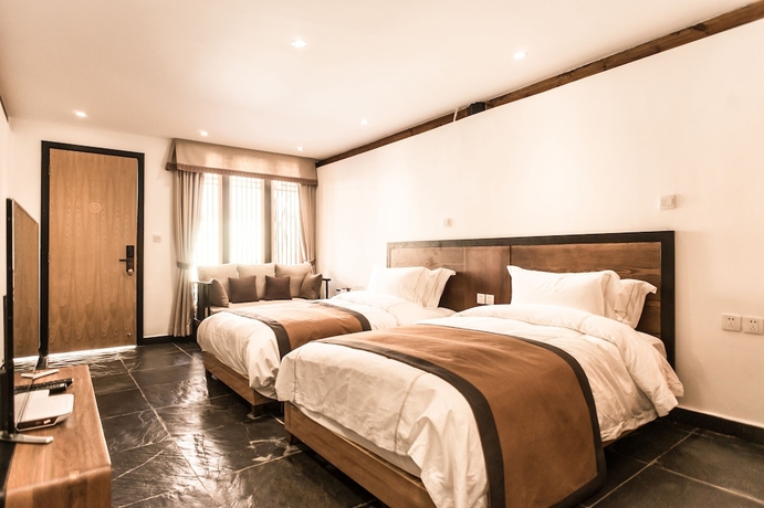 Imagen de la habitación del Hotel Dengfeng Qingjing Courtyard. Foto 16