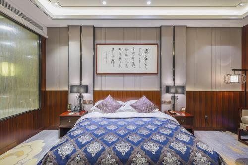 Imagen de la habitación del Hotel Dengfeng Zhongzhou Huading. Foto 14