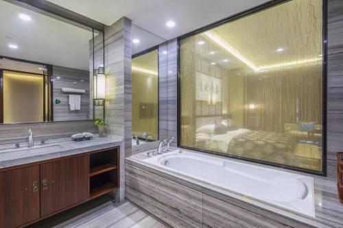 Imagen de la habitación del Hotel Dengfeng Zhongzhou Huading. Foto 16
