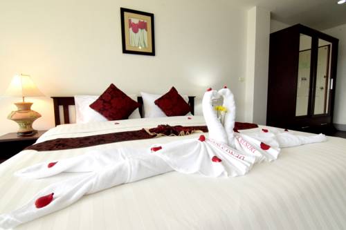 Imagen de la habitación del Hotel Dengs Kamala Resort. Foto 9